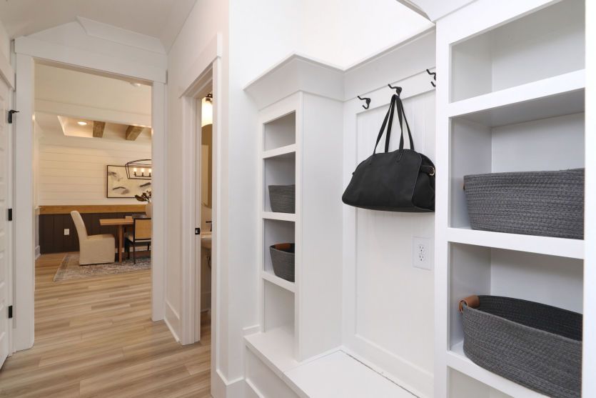 Functional drop zone with built-in storage for everyday organization.