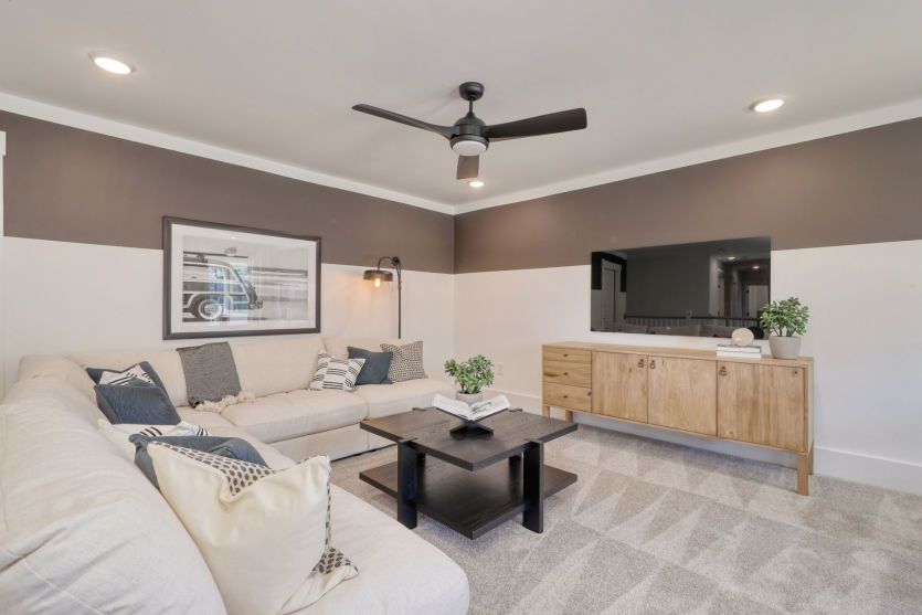 Open loft space ideal for additional living or entertainment.