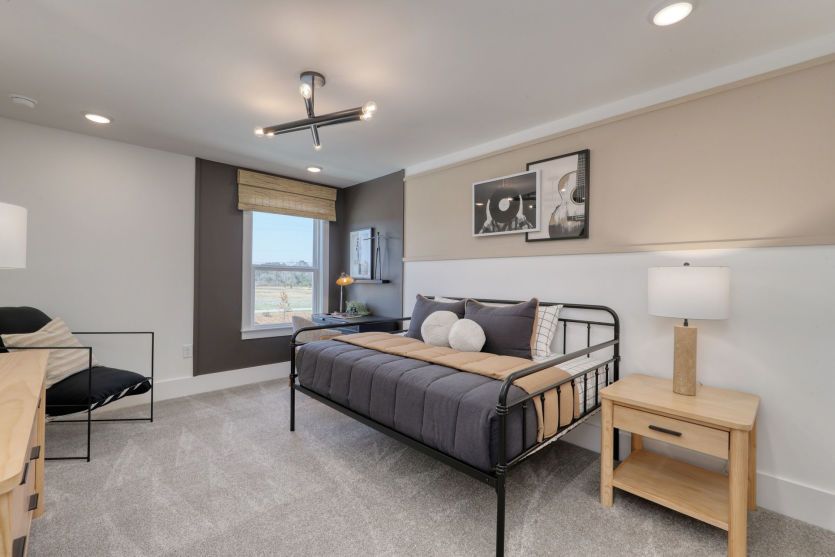 Bright bedroom retreat with modern design and cozy appeal.