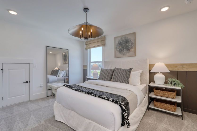 Comfortable guest bedroom with flexible layout options.