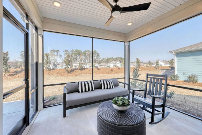 Covered lanai perfect for year-round outdoor living and entertaining.