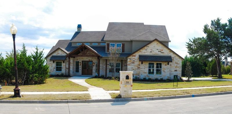 Reagan Custom Home Builders por Regan Custom Homes en Bryan-College Station Texas