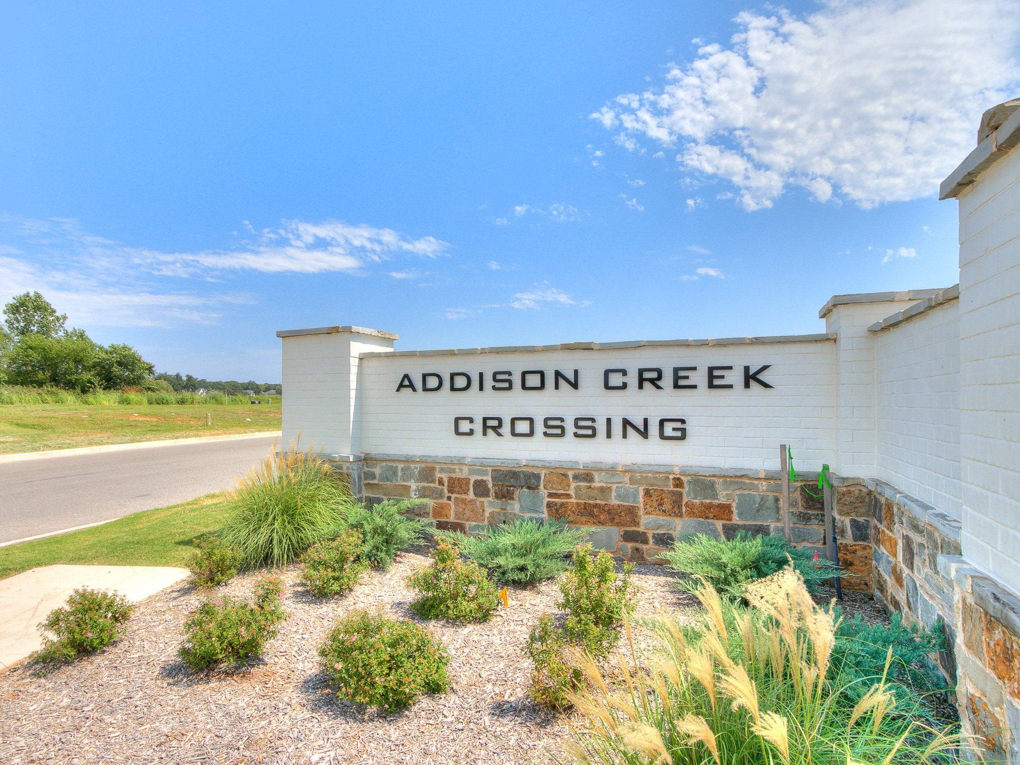 Addison Creek Crossing por Simmons Homes en Tulsa Oklahoma