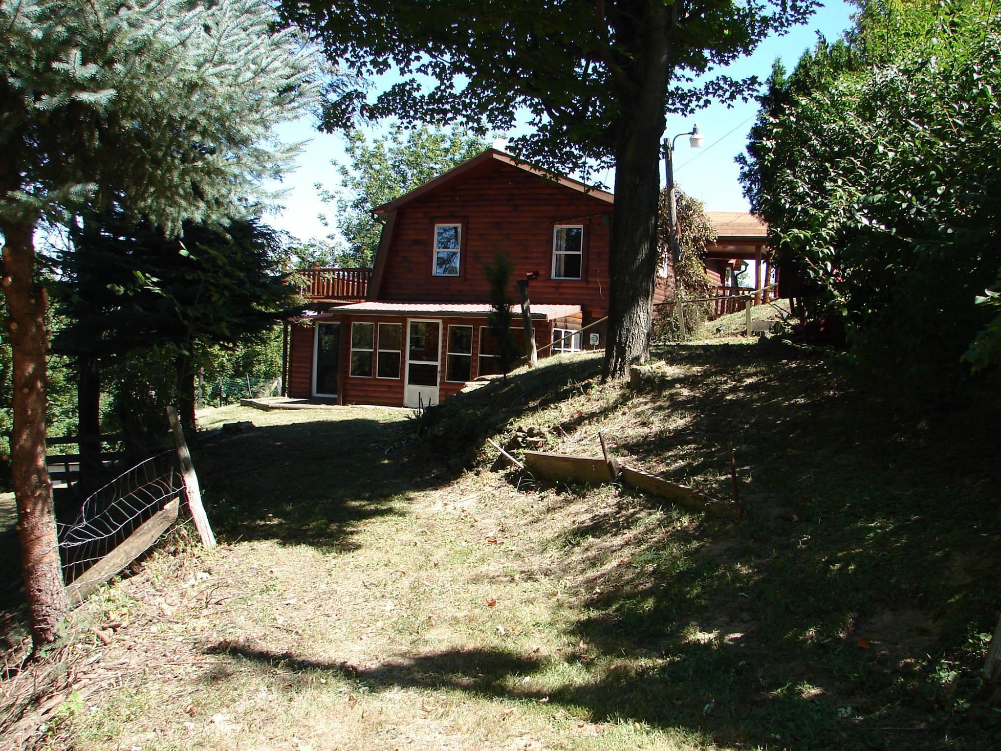 casa en Timeless Timbers, Inc. por Timeless Timbers, Inc.