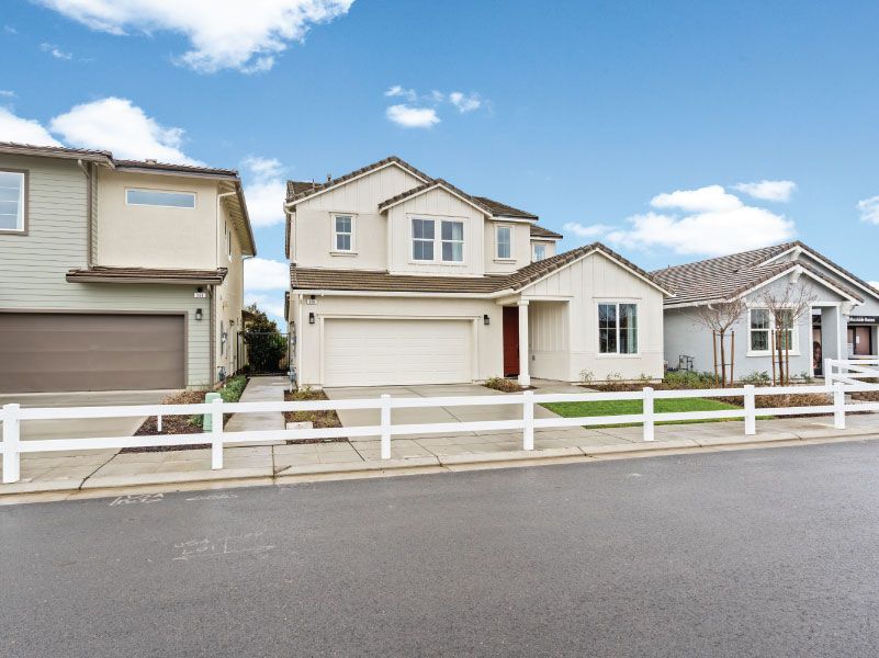 casa en Ovation at Riverstone por Woodside Homes