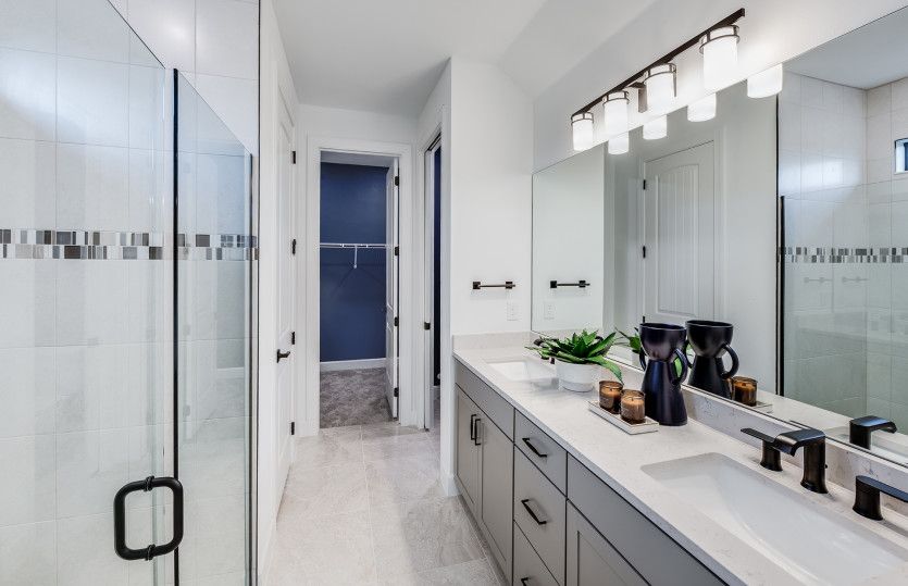 Owner's luxurious bathroom with dual sink vanity