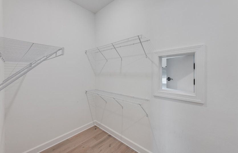 Owner's walk-in closet