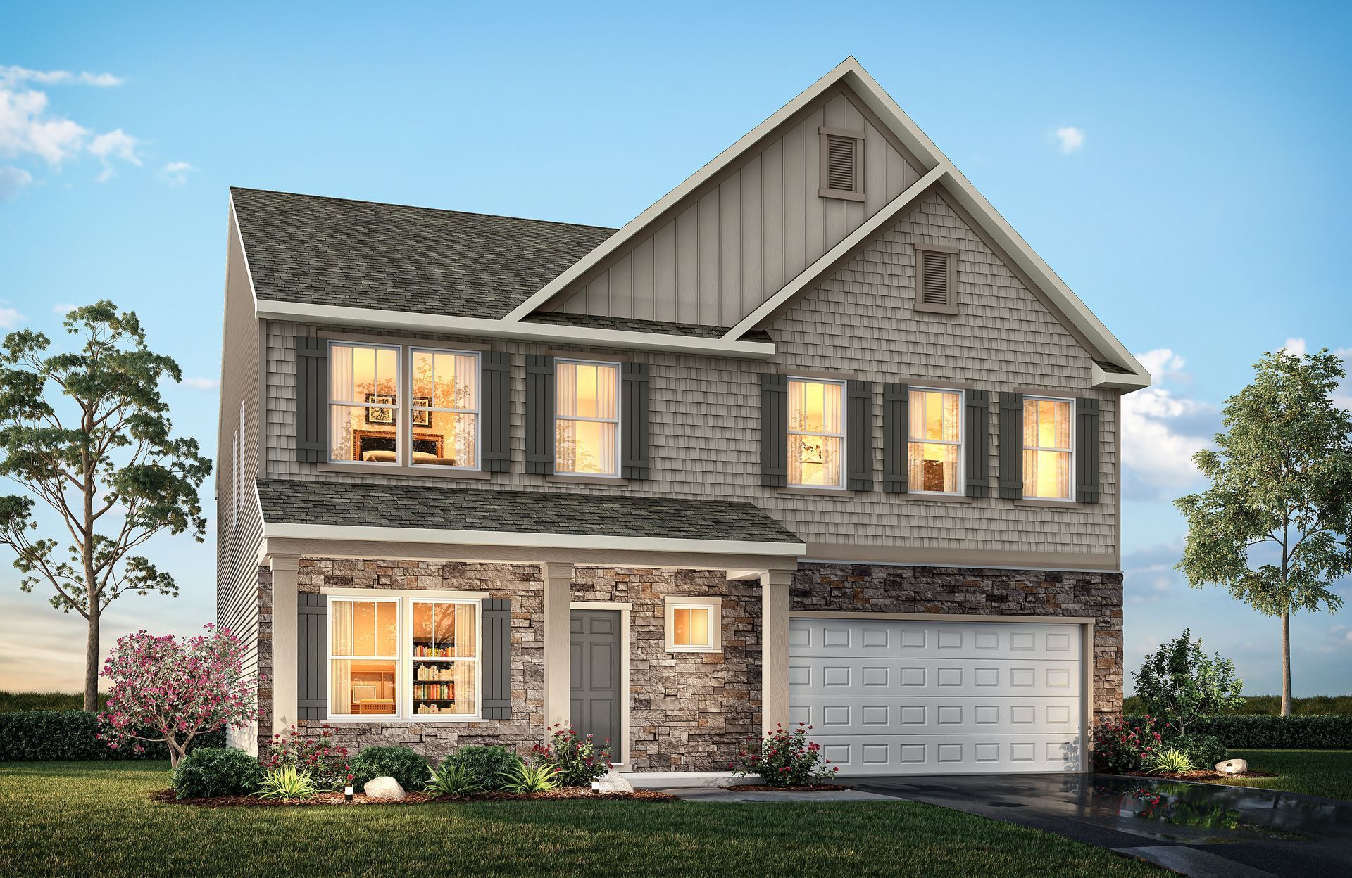 A large brick house with a garage and a lot of windows.