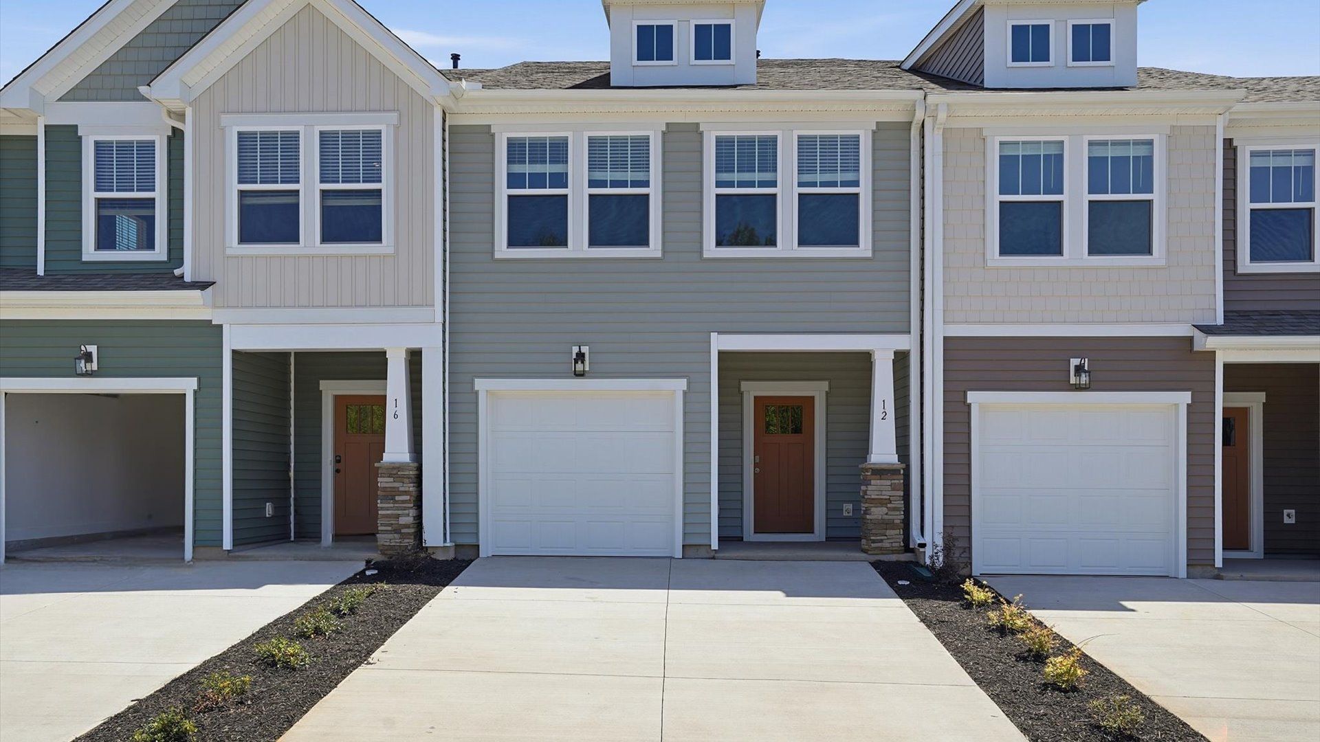 Classic-meets-modern exterior with clean rooflines and thoughtful craftsmanship:Elegant finishes and modern features in this proven DRB Homes design near vibrant downtown life
