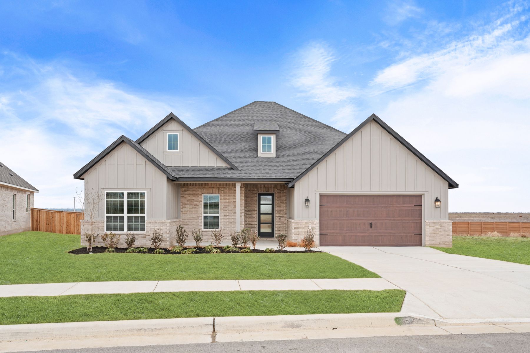 The Fairview by Terrata Homes:The Fairview has a brick and siding exterior.